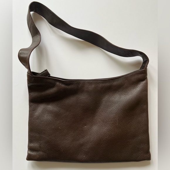 Gently used 100% leather The Sak dark brown purse. - Picture 1 of 3